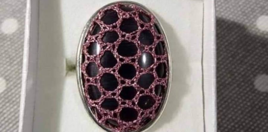 Anillo ovalado con encaje de bolillos